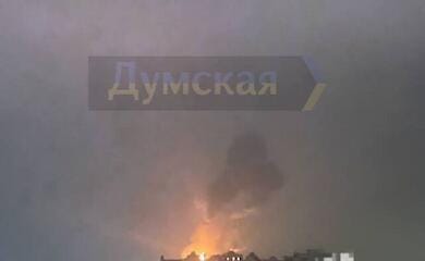 Drone debris hits apartment block in Odessa, causing a fire